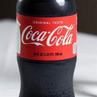 Coca Cola · 20 Oz