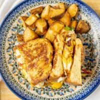 Bacon, Egg & Cheese French Toast · Two fried eggs, american cheese and bacon on two pieces of challah french