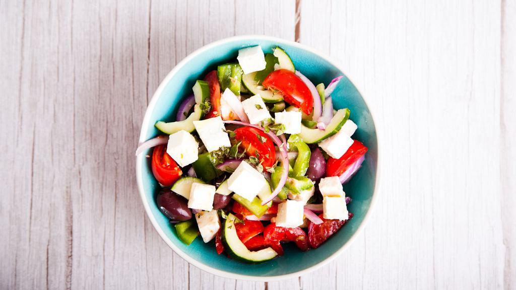 Greek Salad · Fresh Salad made with mixed greens, tomatoes, cucumbers, onion, feta cheese, and olives. Served with customer's choice of dressing.