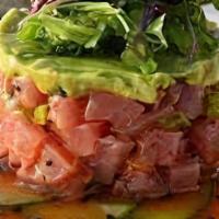 Tuna Tartare · Yellow Fin Tuna, Avocado, Arugula, Endive, Tomatoes, Cilantro