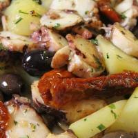 Insalata Tiepida Di Polipo · Warm octopus, potatoes, black olives and capers.