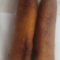 Corn Dogs (2) · Beef Hotdog in a delicious cornmeal and flour based fried coating on a skewer.