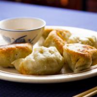6 Pieces Beef Dumplings · Six pieces steamed or pan-fried dough dumplings stuffed with beef; served with a garlicky di...
