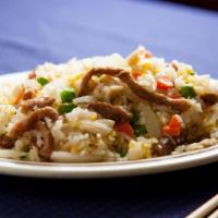 Quart Of Young Chow Fried Rice · Chicken, beef, egg, peas, carrots, and onions with white rice.