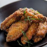 Wings To Go · Fried chicken wings with chili, lime and mint. Moderately spicy.