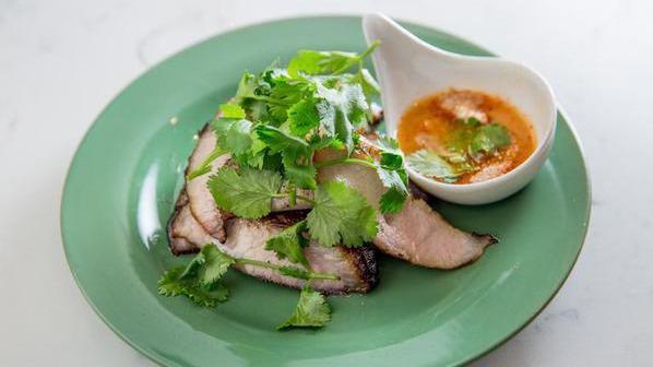 Pork Cheeks To Go · Marinated in fish sauce, served with Jaew sauce and fried garlic