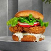 Mister Meatless Crispy Chick'N Sandwich · Crispy meatless chick'n breast topped with mayo, pickles, tomato, and lettuce.  Served on a ...