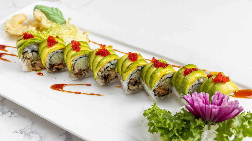 Dragon Roll · Inside: eel, cucumber and sesame seeds. Outside: avocado and tobiko. Sauce: eel sauce.