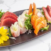 Sashimi Platter · 15 pieces of sashimi. Served with soup or salad.