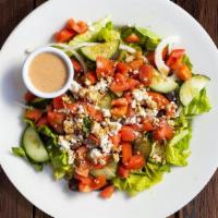So Greek Salad · Romaine lettuce with English cucumbers, red onions, kalamata olives, cherry tomatoes, feta c...