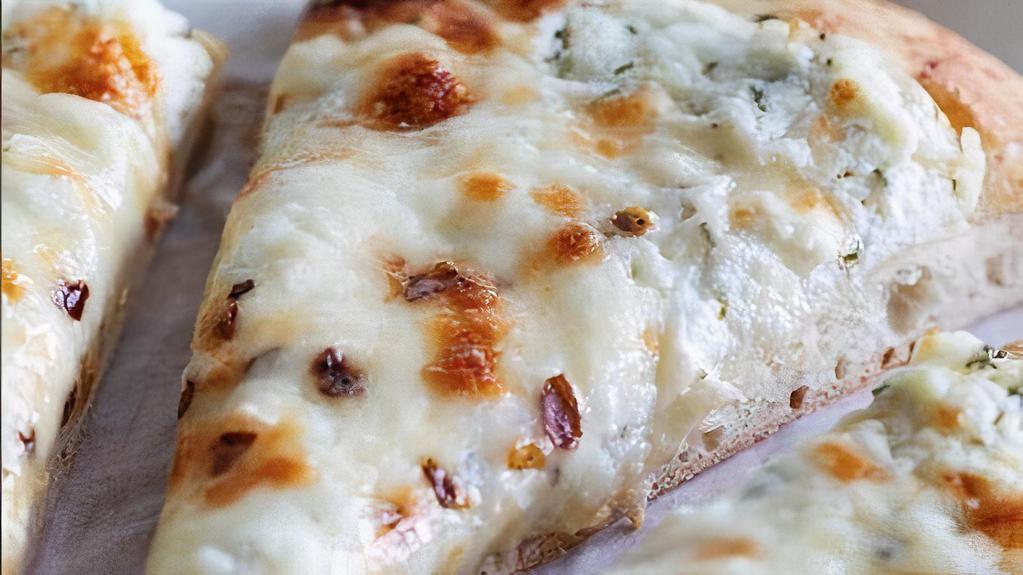 White Ricotta Pizza Slice · Mozzarella and ricotta cheeses and fresh basil. (No
marinara sauce).