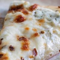 White Ricotta Pizza Pie · Mozzarella and ricotta cheeses and fresh basil. (No
marinara sauce).