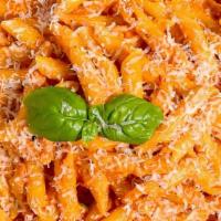 Penne Ala Vodka · Penne style pasta beaded with famous vodka sauce