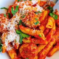Penne With Meatbaslls · Penne style pasta beaded with fresh cooked beef
meatballs and marinara sauce.