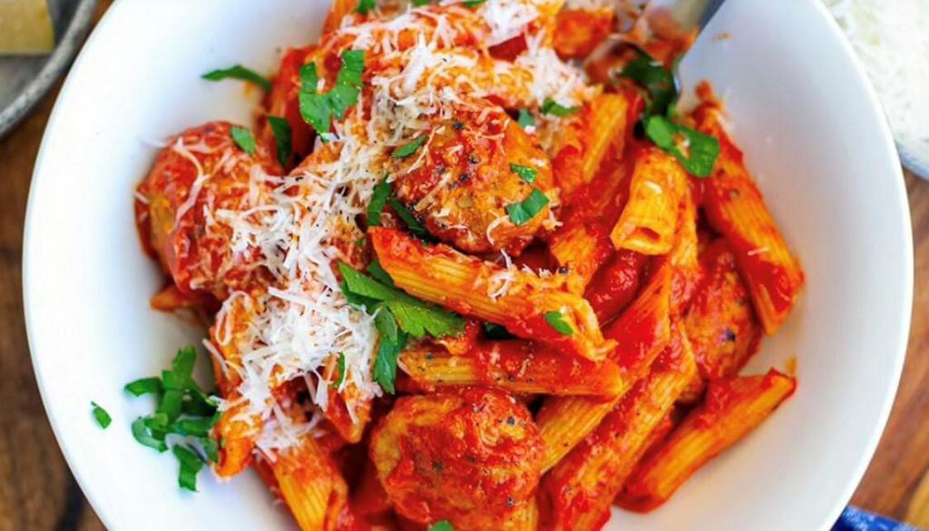 Penne With Meatbaslls · Penne style pasta beaded with fresh cooked beef
meatballs and marinara sauce.