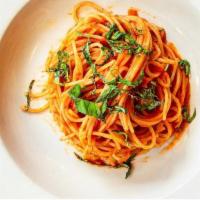 Tomato Sauce Spaghetti · Spaghetti style pasta beaded with warm tomato sauce.