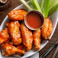 Buffalo Wings · Traditional bone-in wings, hand-tossed in your choice of
sauce or rub. Choose your
flavors! ...