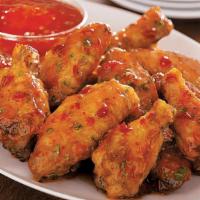 Hot & Sweet Chili Wings · Traditional bone-in wings,Hand-tossed in your choice of
sauce or rub. Choose your
flavors!