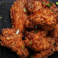 Korean Honey Garlic Wings · Traditional bone-in wings, Breded With Flour & hand-tossed in your choice of sauce or rub. C...