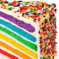 Rainbow Cake · Our best seller - six layers of rainbow-colored vanilla
cake filled high with a sweet vanill...