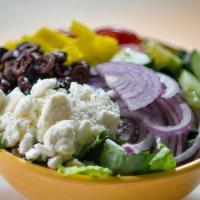 Greek · Cucumber, red onion, banana peppers, Kalamata olives, tomato and feta cheese. Made with a cr...