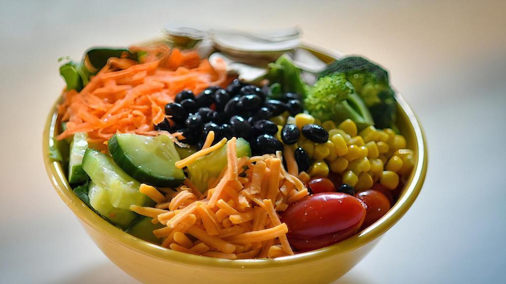 Garden · roasted red peppers, cucumber, tomato, carrot, broccoli, corn, mushrooms, black beans, cheddar cheese