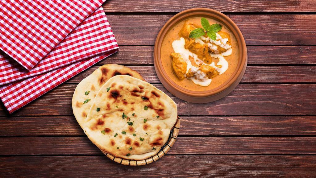 Creamy Butter Chicken & Naan Bread  · A well flavoured and mildly spiced cooked chicken in tandoor and simmered in silky tomato gravy, flavoured in fenugreek served with Naan Bread