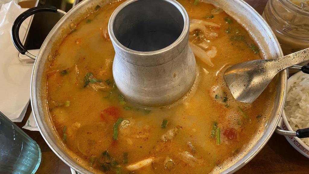 Seafood Tom Yum Soup · Clams, fish filets  and shrimp