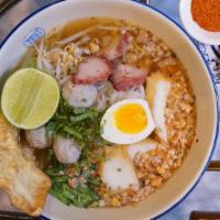 Sukhothai Tom Yum Noodles · Central-style noodle soup; a sour and spicy broth served with rice noodles, pork, homemade f...