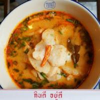 Seafoood  Noodle Soup · Spicy creamy and savory tom yum fish served with rice noodles, homemade fish cakes, shrimp a...