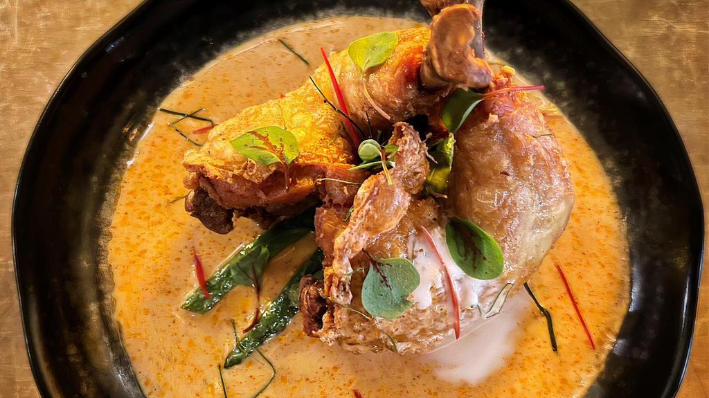 Panang Gai · Chicken confits, flash fried string beans in spicy and sweet creamy Panang curry sauce, kaffir lime leaves and thinly slice red peppers