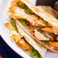 Chicken Quesadilla (2 Pcs) · Warm grilled flour tortillas filled with cheese fresh lettuce, cotija powder cheese, and sou...