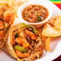 Shrimp Burrito · Mexican rice, pinto beans, lettuce, Monterrey Jack cheese, sour cream, and our homemade sals...