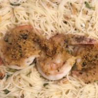 Shrimp Oreganato · Jumbo shrimp baked in a garlic, butter and lemon sauce, topped with seasoned bread crumbs. 
...