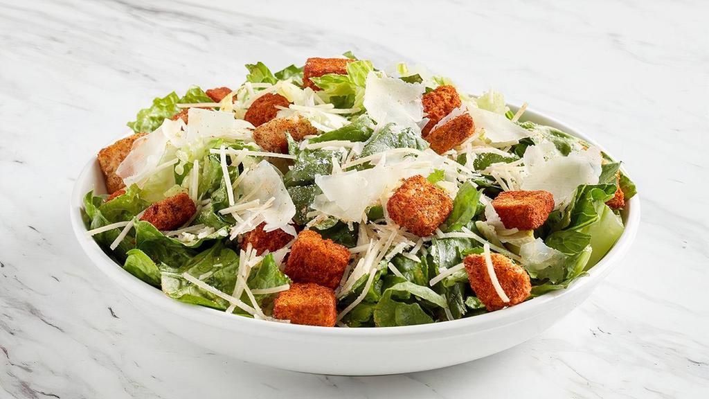 Family Salad: Caesar · Shaved Parmesan, chile-dusted croutons, scratch-made Caesar dressing (Serves 4-6)