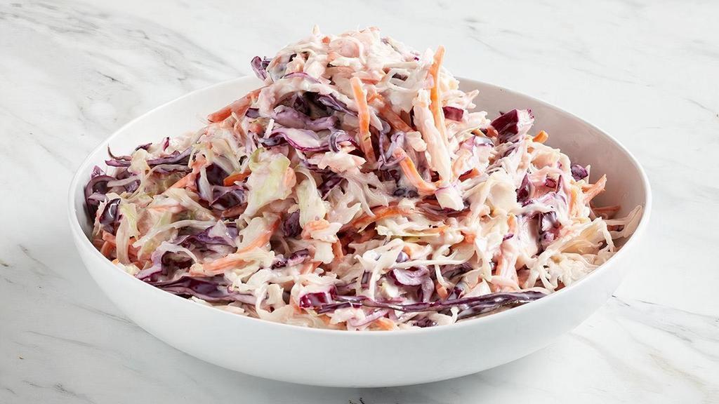 Family Side: Cider Slaw · Our take on cole slaw with apple cider vinegar sweet and sour creamy dressing (Serves 4-6)