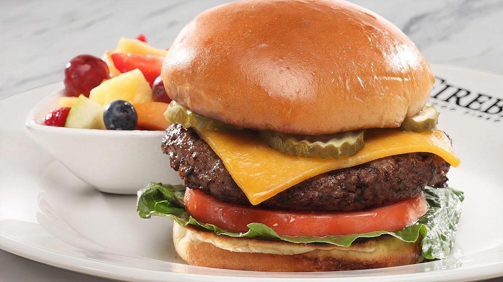 Cheeseburger* · Cheddar, lettuce, tomato, red onion, brioche bun