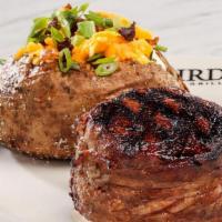Filet Mignon*  · Center-cut, wrapped in applewood-smoked bacon