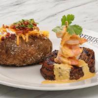 Filet & Shrimp* · Bacon-wrapped tenderloin topped with shrimp in a Key lime butter sauce