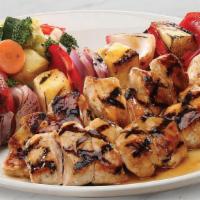 Pineapple Chicken · Citrus-seasoned kabob, grilled and basted with pineapple-honey chile glaze, choice of side