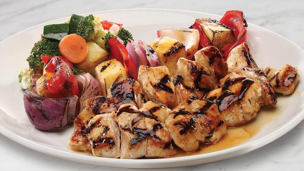 Pineapple Chicken · Citrus-seasoned kabob, grilled and basted with pineapple-honey chile glaze, choice of side