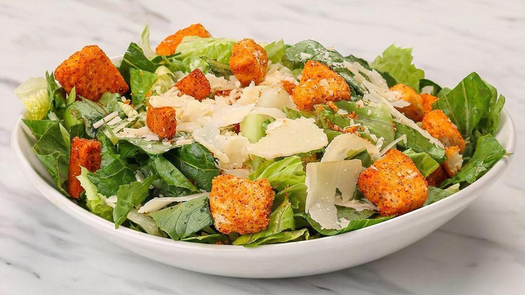 Caesar Salad · Shaved Parmesan, chile-dusted croutons
