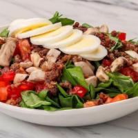 Spinach Salad · Applewood smoked bacon, mushrooms, tomatoes, egg, balsamic vinaigrette