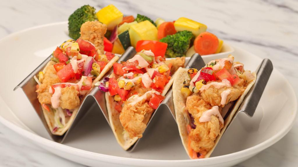 Kids Fish Tacos · Grilled or crispy fish with charred corn salsa
