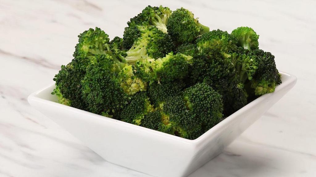 Broccoli · Steamed broccoli with garlic herb butter