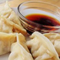 Steamed Pork Dumplings (8) · With Dumpling Sauce
