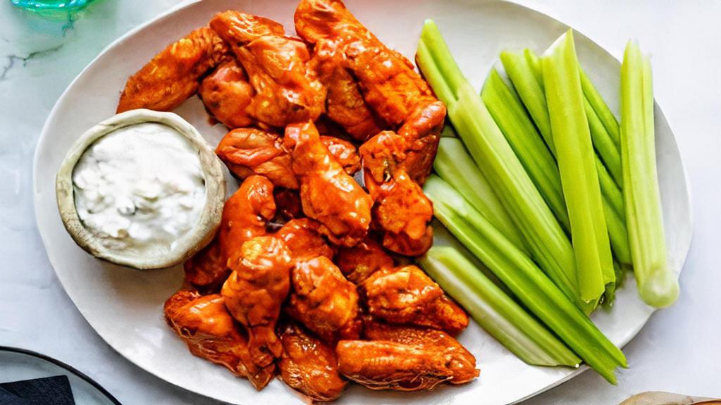 Traditional Party Wings (6Pcs) · New Items ,  Deep Fried Chicken Wings Sauteed in your choice , Buffalo Sauce , Sweet Chili, Original BBQ Sauce, Chipotle BBQ Sauce , Garlic parmesan , lemon pepper, Sweet Teriyaki Sauce, and come with celery and blue cheese or ranch .
