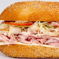 Big T  · Golden Roasted Turkey Breast, Imported Ham & American Cheese.