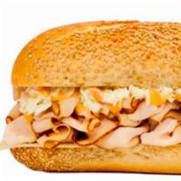 Turkey Schwartzie · Golden Roasted Turkey Breast, Swiss Cheese, Coleslaw & Russian Dressing.