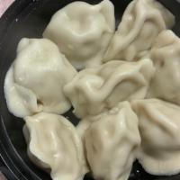 Steamed Dumplings · Eight pieces.